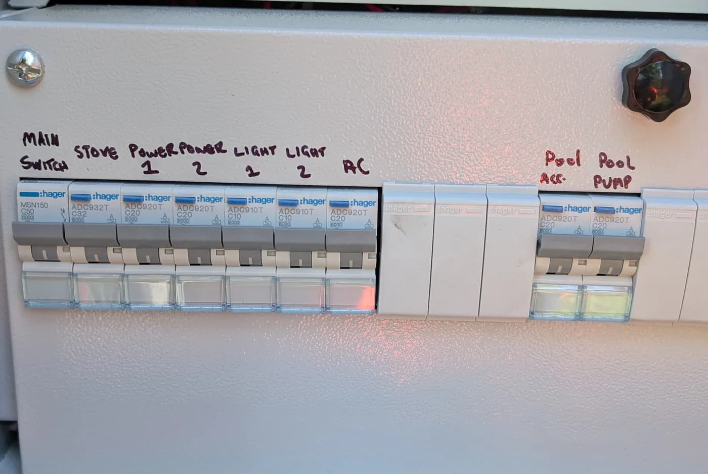 A row of labelled circuit breakers in a switchboard