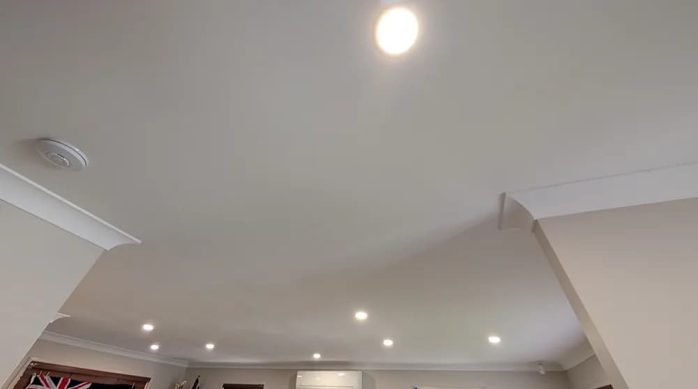 LED downlights recessed into a freshly finished ceiling