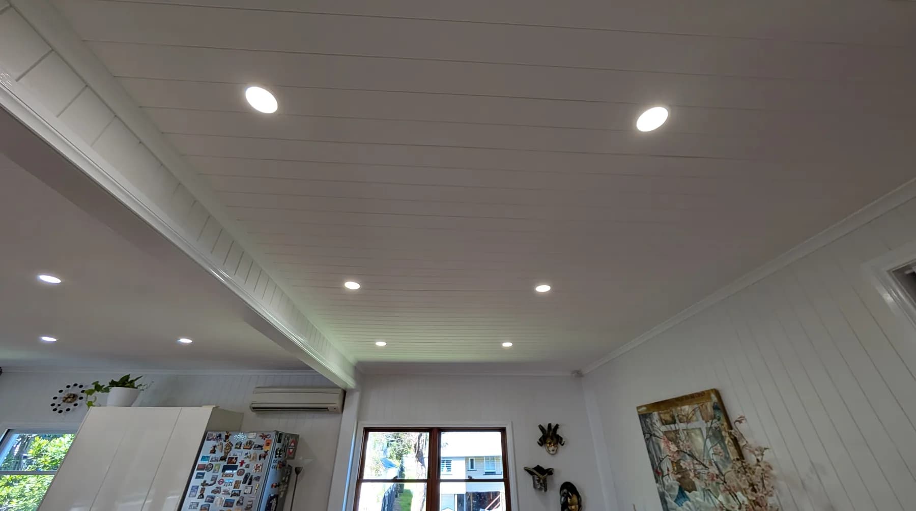 Recessed LED downlights in a finished living area