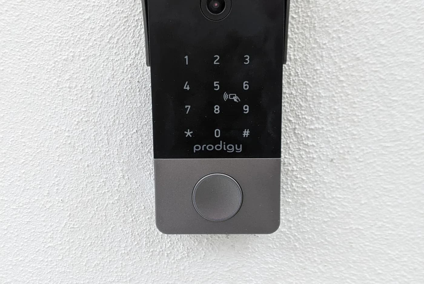 A keypad entry unit mounted beside a door