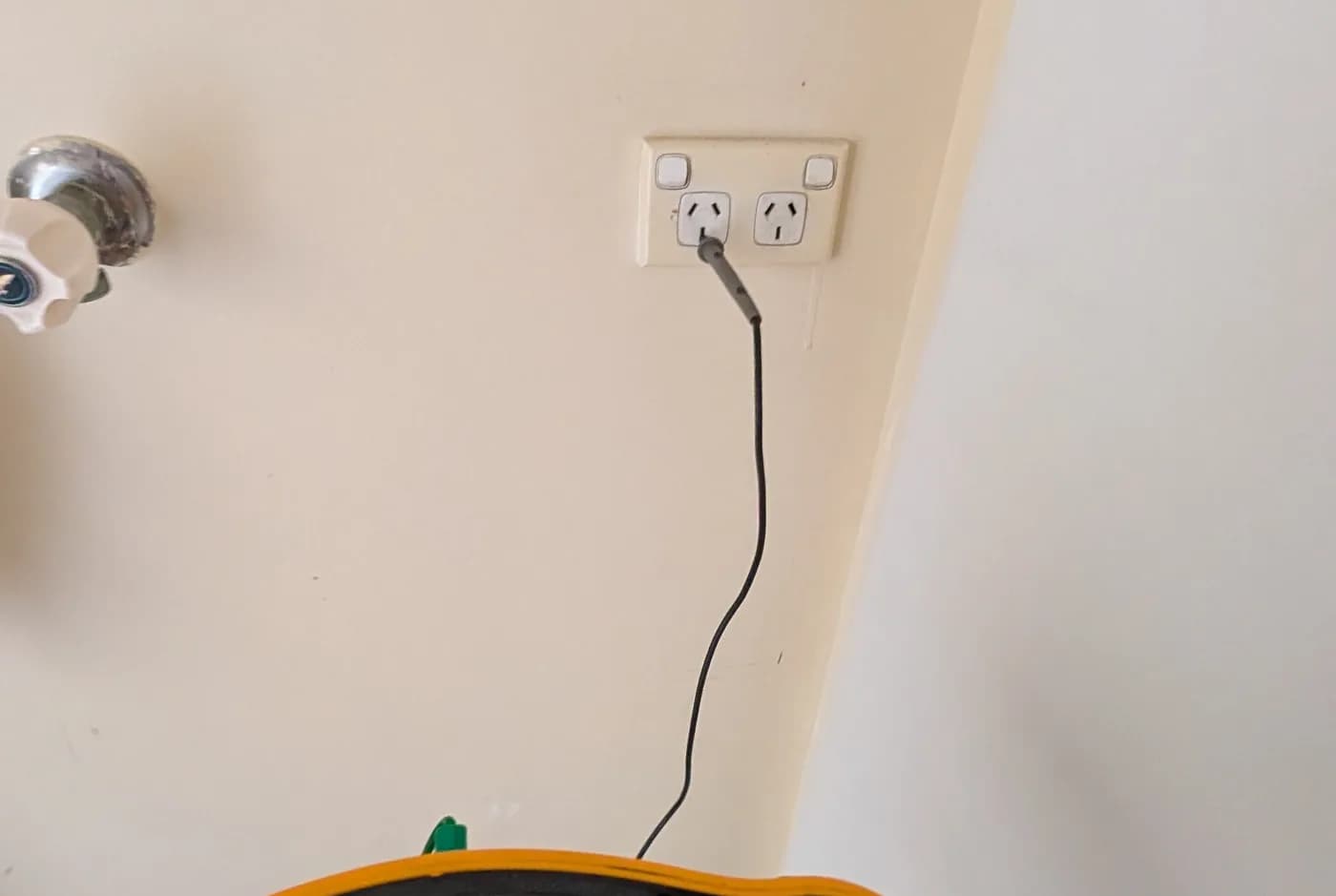 An insulation tester showing a reading during testing