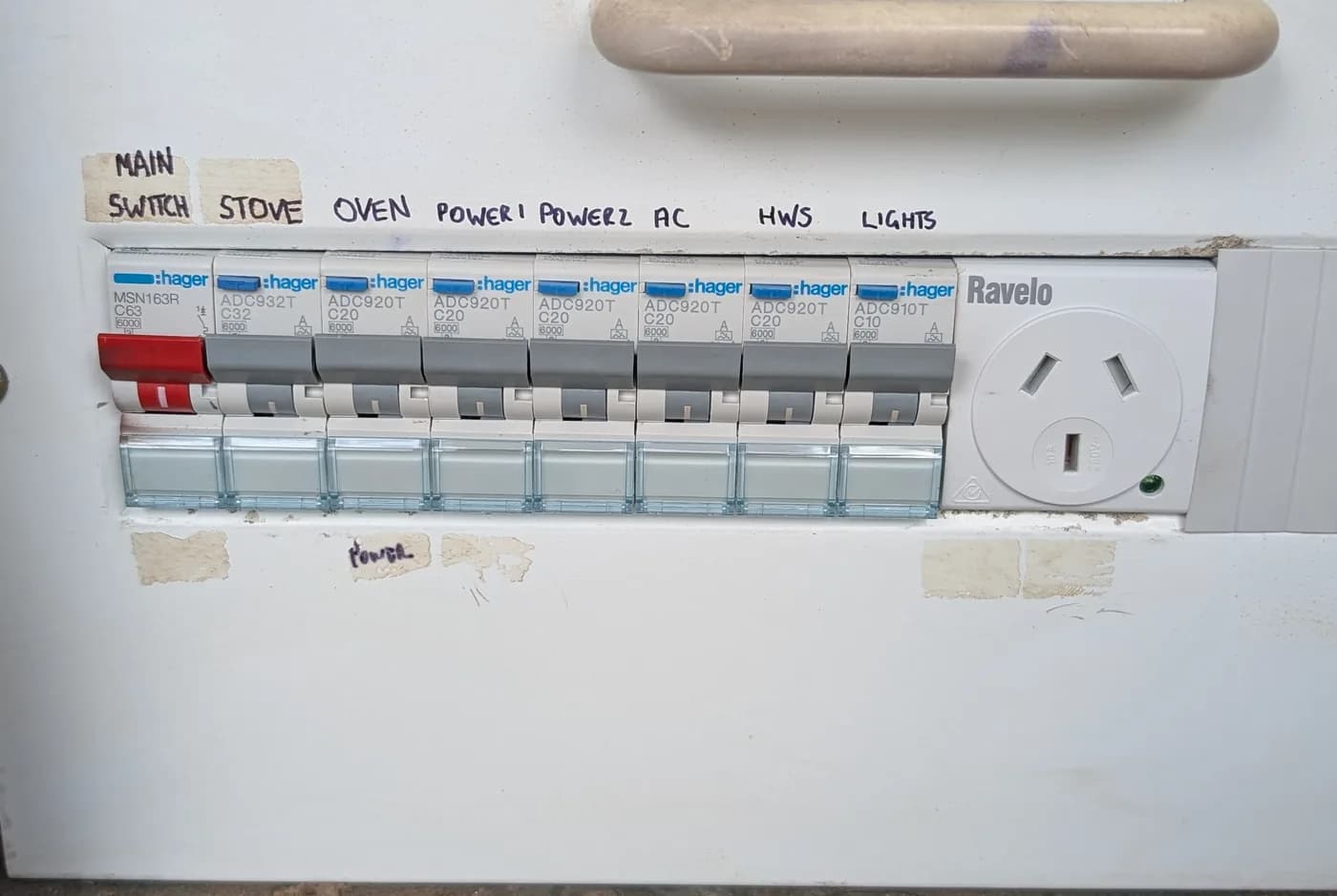 An older switchboard with the original circuit protection